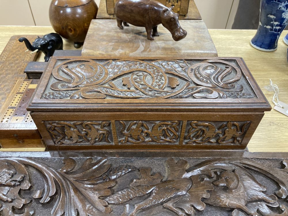Three inlaid wooden boxes, a carved oak box, two cribbage boards and sundry treen, 19th/20th century